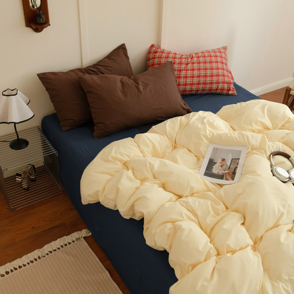 Cheese Thick Milk cream washed bedding set styled with red plaid pillows