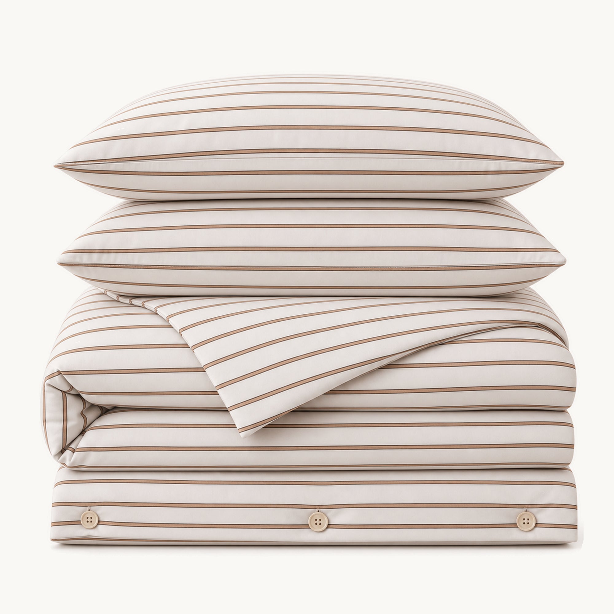 Stacked Brown Stripe cotton sateen bedding set on a warm off-white background