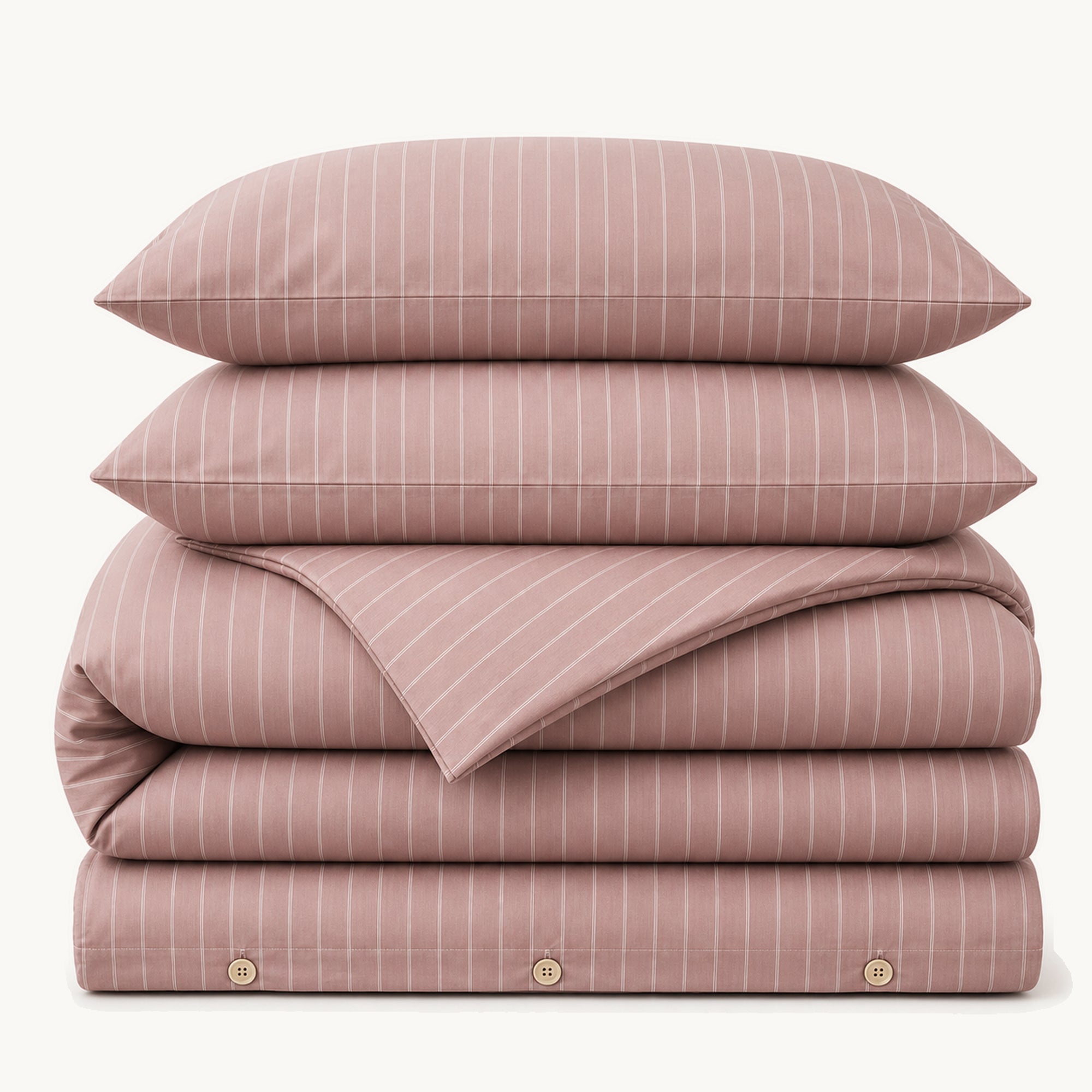 Stacked Mocha Stripe cotton sateen bedding set on a warm off-white background